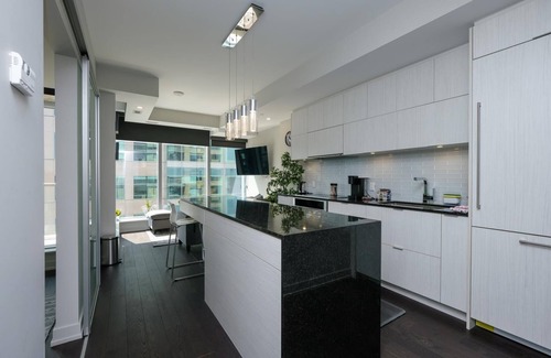 Byward Market - Parliament Hill Condo | Luxury one bedroom w patio steps from parliament