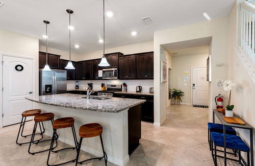 Loughman House | Luxury pool home at Solterra. Resort Pools, Waterslides, Clubhouse, Lazy River