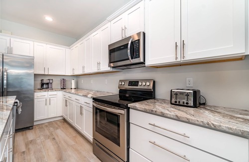Pelican Villa | Luxury Retreat: 3BR with Pool, Hot Tub & Games