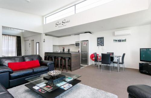 Taupo Apartment | Luxury Riverfront Apartment With Views and Pool Access