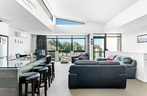 Taupo Apartment | Luxury Riverfront Apartment With Views and Pool Access