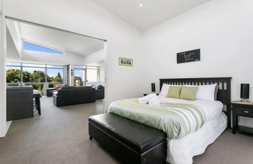 Taupo Apartment | Luxury Riverfront Apartment With Views and Pool Access