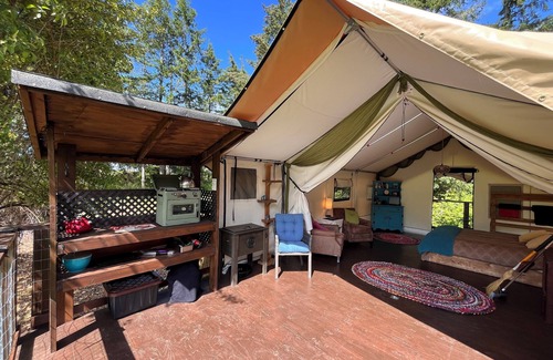Campbell River RV Rental | Luxury Safari tent adjacent to the beach, following a nature trail to the river