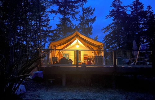 Campbell River RV Rental | Luxury Safari tent adjacent to the beach, following a nature trail to the river
