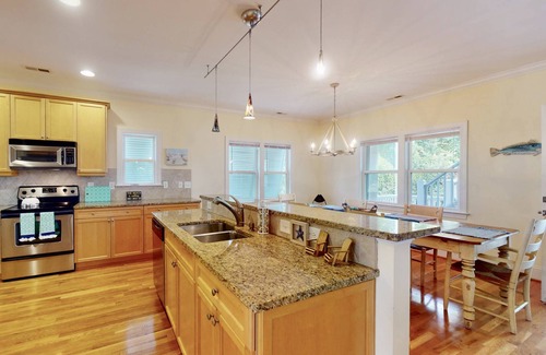 Kure Beach House | Luxury SeaWatch Home w/2 King Suites, 2 Decks, Pool, Tennis, Beach Access & Dog Friendly