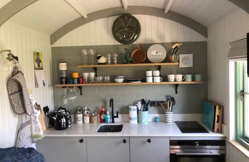Stone in Oxney Cabin | Luxury Shepherd's Hut with woodburnern