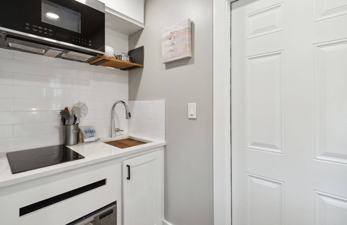 Ocean Cay Apartment | Luxury Studio Steps to Beach Kitchenette Outdoor Seating