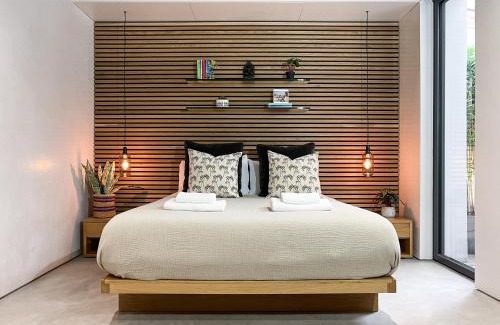 London Borough of Hounslow Apartment | Luxury Urban Oasis with Garden and Private Studio