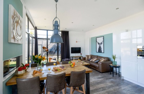 Hulshorst Ski Chalet | Luxury vacation home sea view Maximal Plus directly on Lake Veluwe