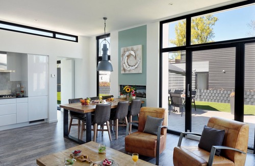 Hulshorst Ski Chalet | Luxury vacation home sea view Maximal Plus directly on Lake Veluwe