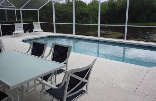 Sabal Harbour Villa | Luxury villa with large pool & lake frontage. Close to Disney Parks and Beaches