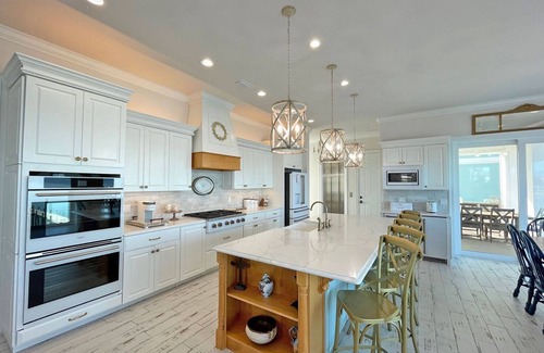 Pensacola Beach House | Luxury Water Front Home with a Private (Heated) Pool & Swim-up Bar!
