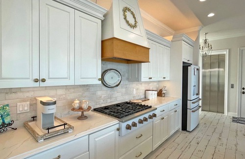 Pensacola Beach House | Luxury Water Front Home with a Private (Heated) Pool & Swim-up Bar!