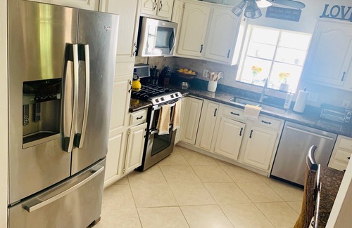 Riviera Isles House | Luxury WATERFRONT Estate! Golfcart, STEAM SHOWER, heat pool, steps to the beach!