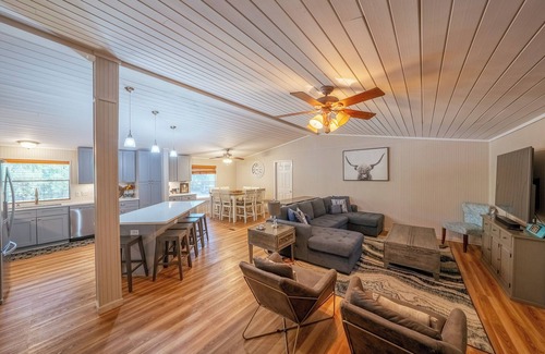 Kingsland House | Luxury WATERFRONT home with HEATED POOL AND SPA Sleeps 28+