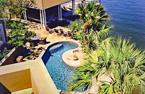 Horseshoe Bay House | Luxury waterfront home, private small beach on open water, pool,