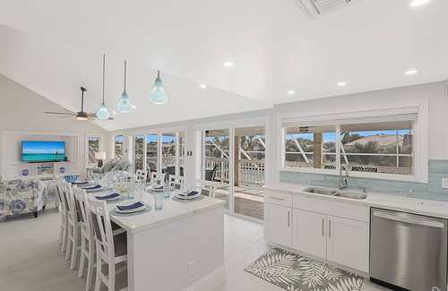Marco Island House | Luxury WaterFront Pool Home, Beach Parking, Kayaks SUP's Bikes Pool/PingPong Tbl