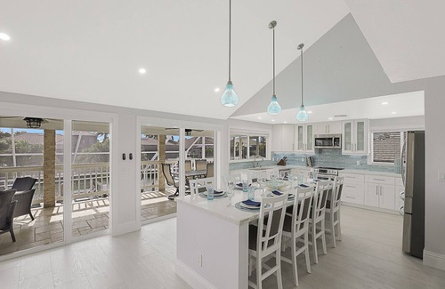Marco Island House | Luxury WaterFront Pool Home, Beach Parking, Kayaks SUP's Bikes Pool/PingPong Tbl