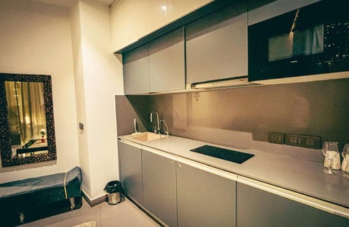 Noida Apartment | LUXY 1-bedroom apartment with WiFi, AC in delightful Noida