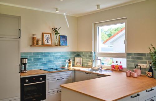 Timmendorfer Strand Apartment | Lykke Hus - Wohnung Mathildas Garten EG