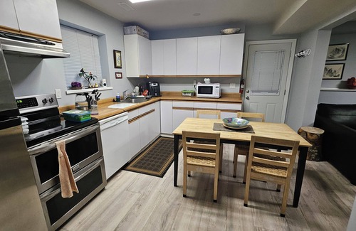 District of North Vancouver Apartment | Lynn Valley Private Garden Suite
