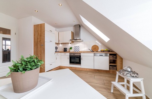 Greetsiel Apartment | Mühlenblick 03 - Moderne Ferienwohnung mit Blick auf die Zwillngsmühlen