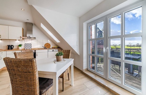 Greetsiel Apartment | Mühlenblick 03 - Moderne Ferienwohnung mit Blick auf die Zwillngsmühlen