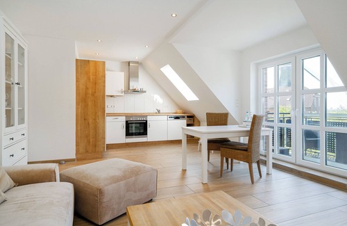 Greetsiel Apartment | Mühlenblick 03 - Moderne Ferienwohnung mit Blick auf die Zwillngsmühlen
