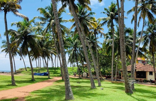 Varkala Resort | Maadathil Cottages