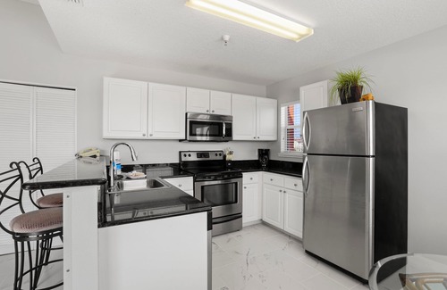 Madeira Beach Condo | 🌅 Madeira Bay Resort #413 – Spacious Two-Bedroom Retreat with Dual Balconies & Marina Views