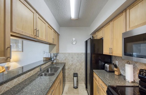 Madeira Beach Condo | Madeira Beach Yacht Club 247F | Balcony, Dock, Pool + Hot Tub Access