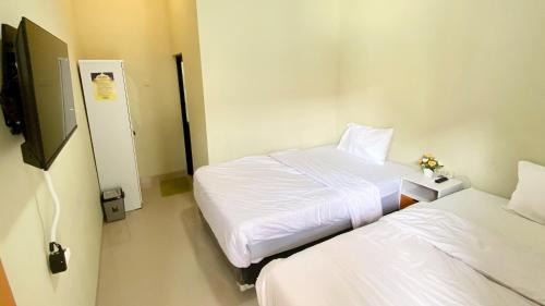 Banguntapan Hotel | Madina Guest House Syariah near Gembira Loka Zoo Yogyakarta Mitra RedDoorz