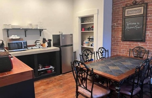 Madison House | "Madison Manor I" by The River: Nice patio, hot tub, gas grill, and fire pit