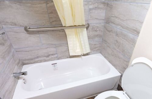 Irving Hotel | Magnuson Extended Stay and Suites Airport Hotel