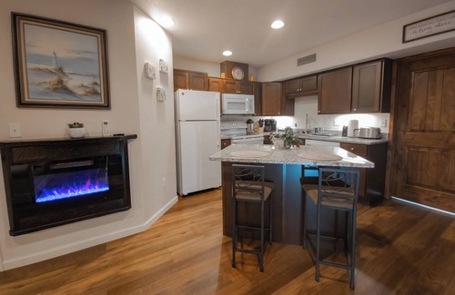 Pinehurst Condo | Main floor studio well-furnished room. Unit 2 with bath/shower bidet toilet