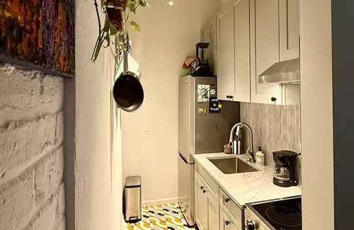 French Quarter Apartment | Maison Rouge in French Quarter. Includes 2 Endymion Ball Tickets