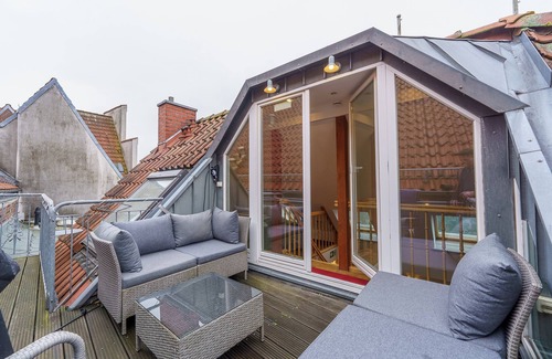 Lubeck City Centre Apartment | Maisonette at Holstentor with roof terrace and home cinema