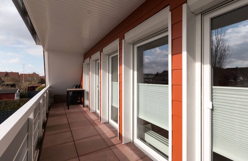 Norddeich Apartment | Maisonette-wohnung mit 2 Schlafzimmern + 2 Überd. Balkonen 60 m² bis zu 6 Pers