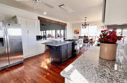 Grand Isle House | Majestic bayfront home. 450’ pier w/boat access, crabbing, fishing, & swimming.