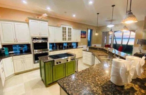 Cocoa Beach Villa | Majestic Waterfront Mansion in Cocoa Beach and Sunset Cove| Private dock and Pool