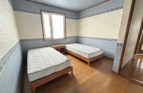 Makkari-mura Villa | Makkari Grey House