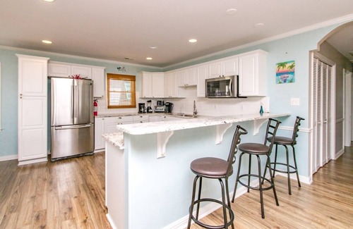 Surf City Condo | Mama's Pride - 3BR Home on the Canal - Boat Dock & Sound Views!