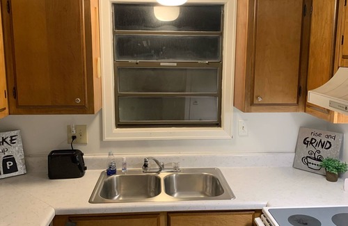 Hardy House | Many Moons Townhouse Heated Pool, Rivers, Lakes, and Golf Getaway