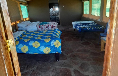 Maasai Mara Cabin | Mara view safari camp