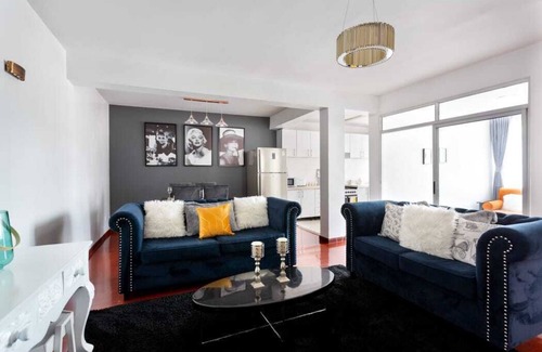 Kilimani Apartment | Marilyn Monroe themed 2bed, for comfort, relaxing decor, lounge area to work.