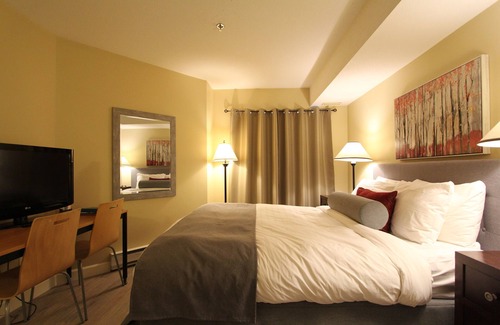 Village North Hotel | Marketplace Lodge #2H7 | Hotel Room with Queen Bed and Balcony