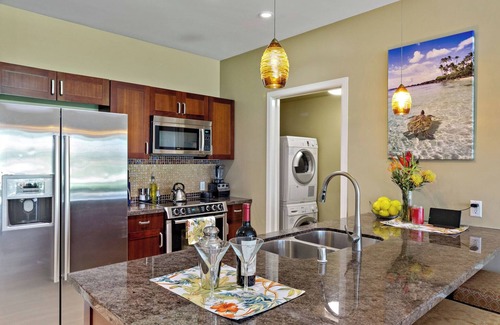 Honokowai Condo | Maui Resort Rentals: Groundfloor Interior Honua Kai Konea 105, Large Lawn Area, Steps to Pools/Beach/B.B.Q.s!