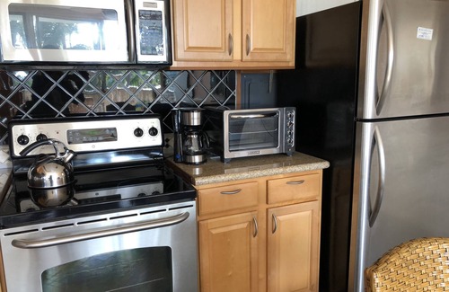 Kuau Apartment | Maui's best Surf, wdsurf, snorkeling by secluded beach+ AC