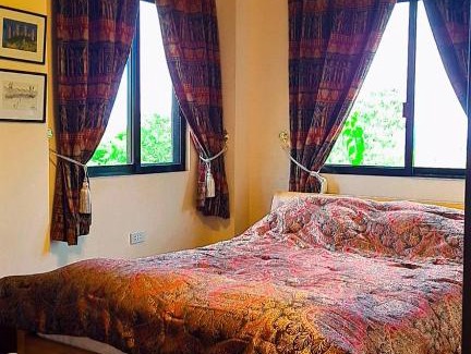 Mambajao Apartment | Mccormick-Residence Gardens Resort
