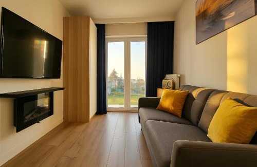 Mechelinki Apartment | Mechelinki, Apartament z ogródkiem, widokiem na morze i aneksem kuchennym